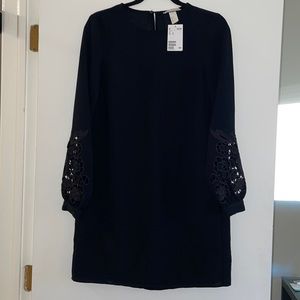 Long sleeve dress, hits above knees